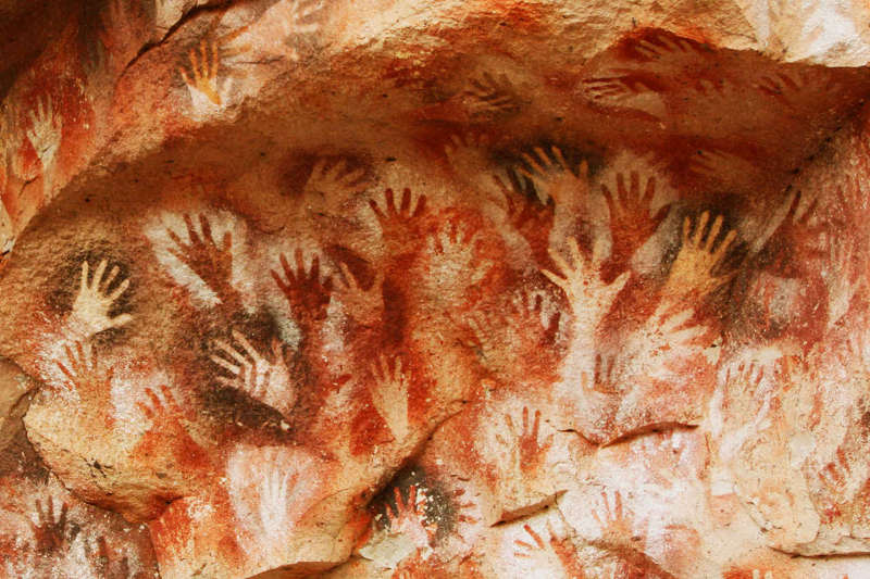 The photo of cave art from the book's cover